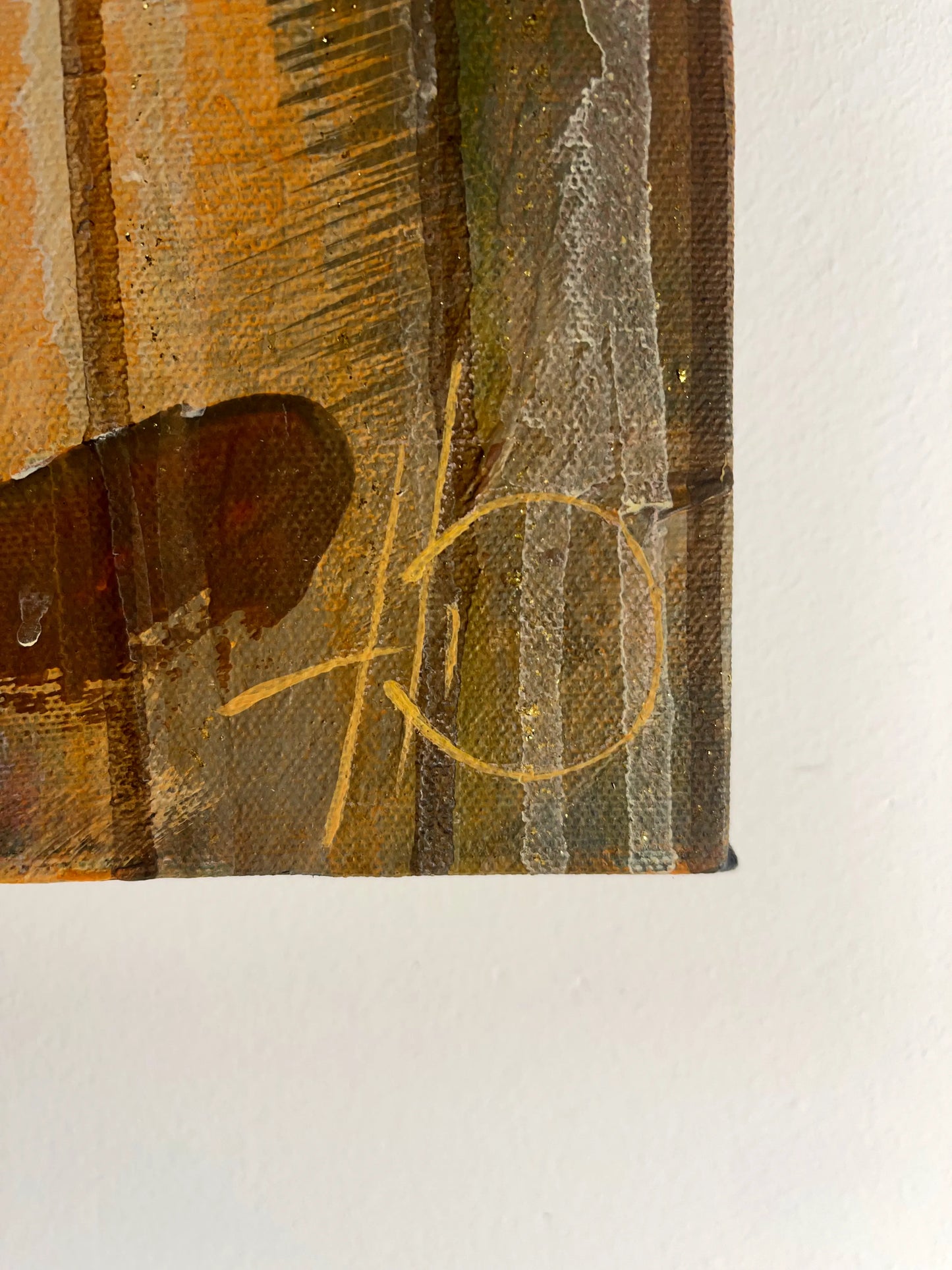 Detail: Goldene Signatur des Künstlers Daniel Heinz, Danh1Z in der unteren rechten Ecke des Elefanten-Gemäldes.